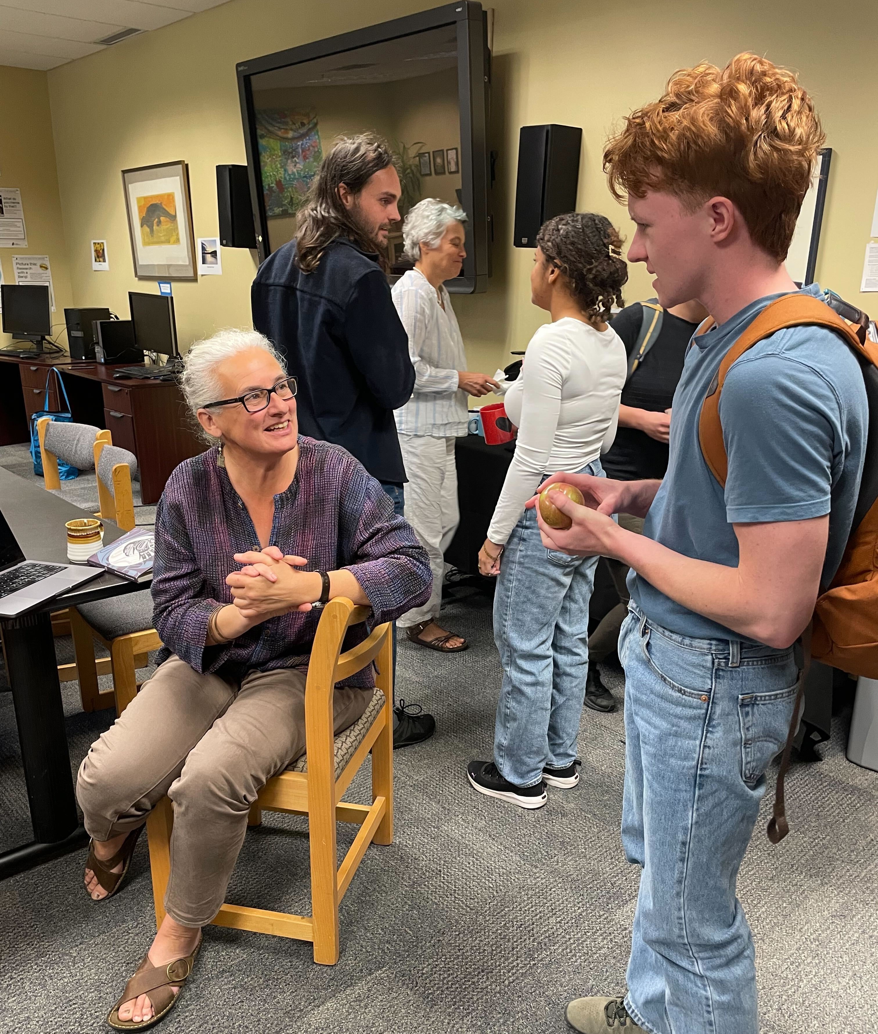 Mary Stockdale and student talk