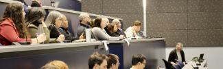 People sit in rows